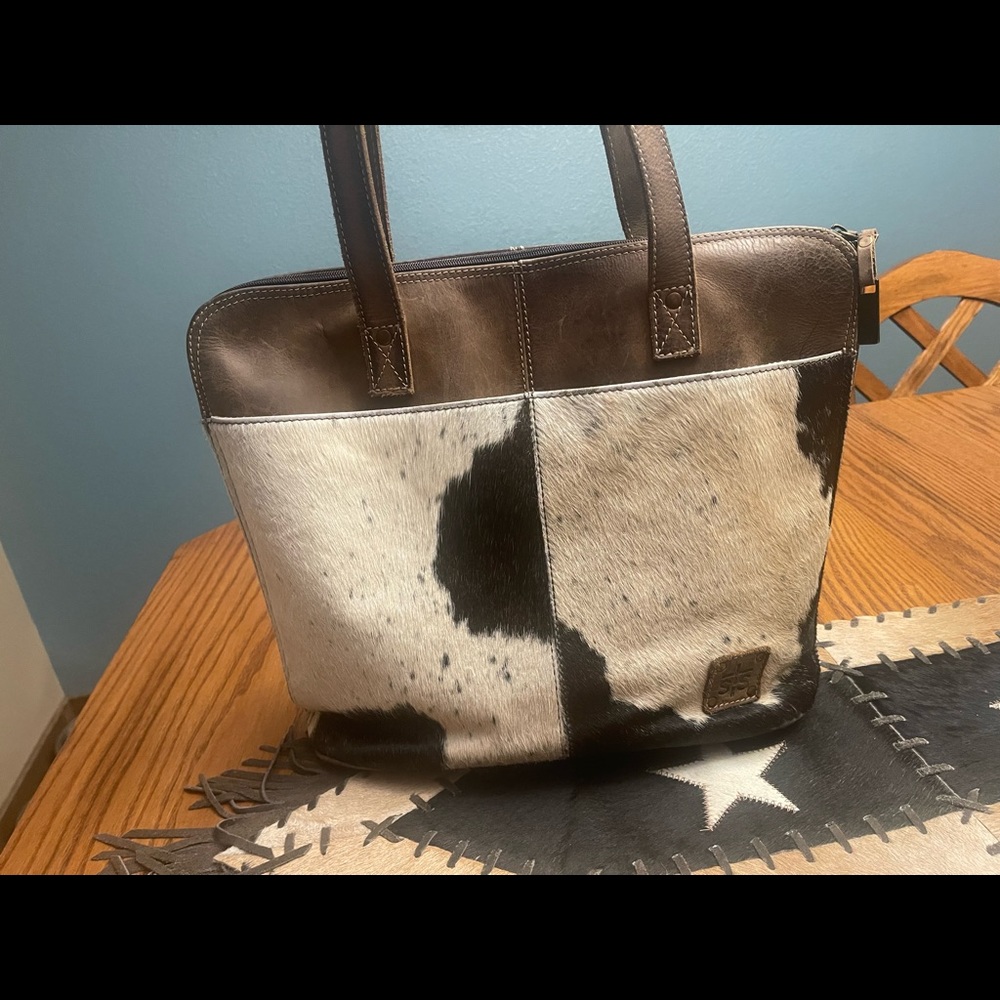 cowhide purse in good condition like new barely used